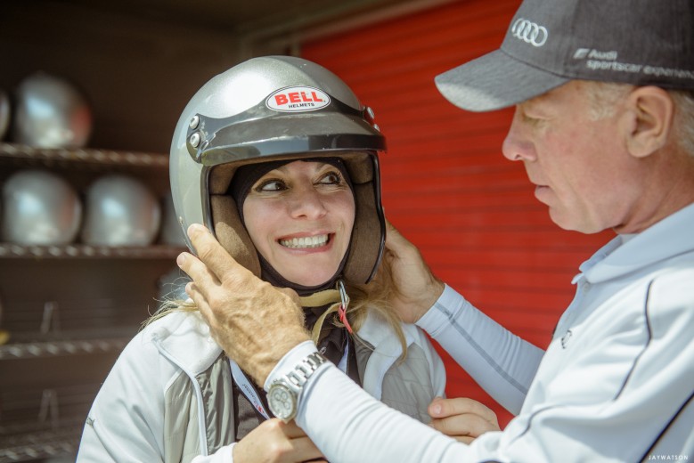 Audi driver getting fitted for a helmet. Sonoma Raceway | Audi sportscar experience
