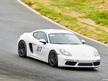 Porsche 728 Cayman S in turn 6. Sonoma Raceway | Apex Wheels