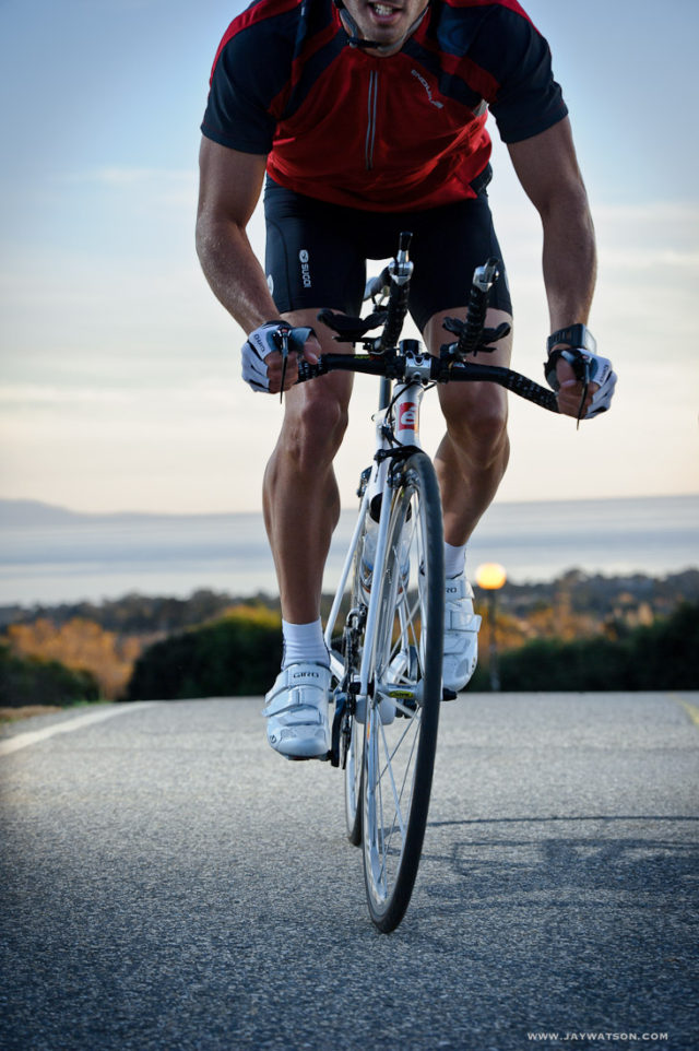 Triathlete Eric Clarkson cycling in Santa Cruz, CA